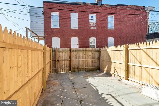 a front view of a building with a outdoor space