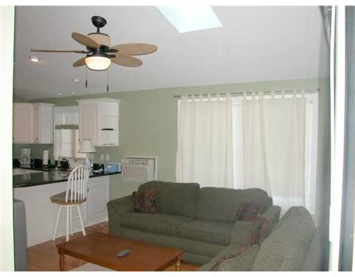 1413 Post Road, Unit 9 Wells, ME 04090 - Photo 4 of 10 Living Room. This open concept...