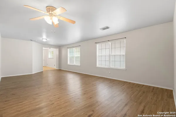 a view of an empty room and window