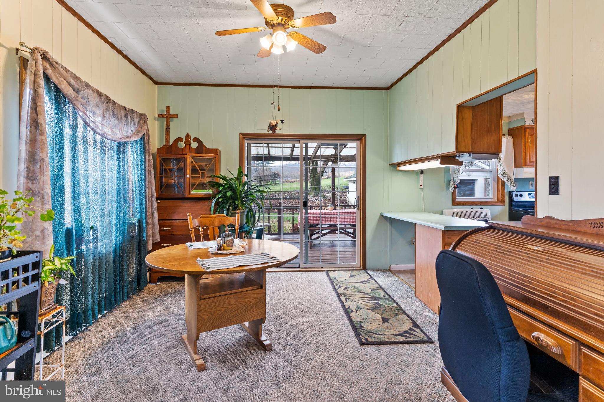 21 Hallton Hill Road Pine Grove, PA 17963 - Photo 3 of 22 a living room with patio furniture and a chandelier