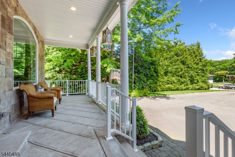 99 East Lindsley Road Cedar Grove, NJ 07009 - Photo 39 of 41 a balcony with wooden floor and outdoor seating
