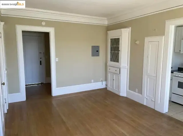a bathroom with a window and a bathtub