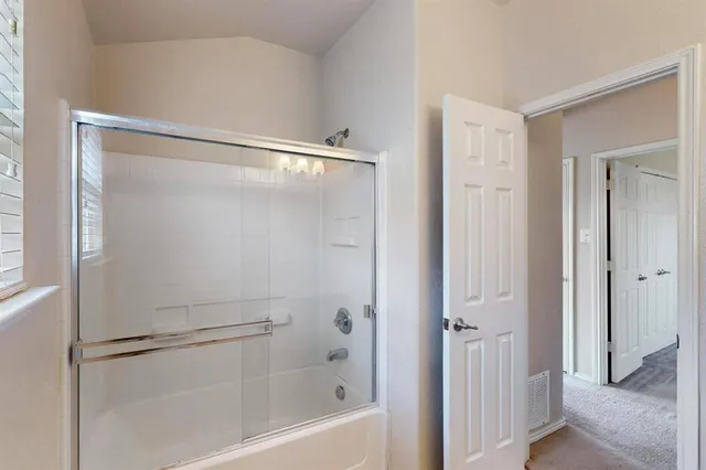 a bathroom with a bathtub