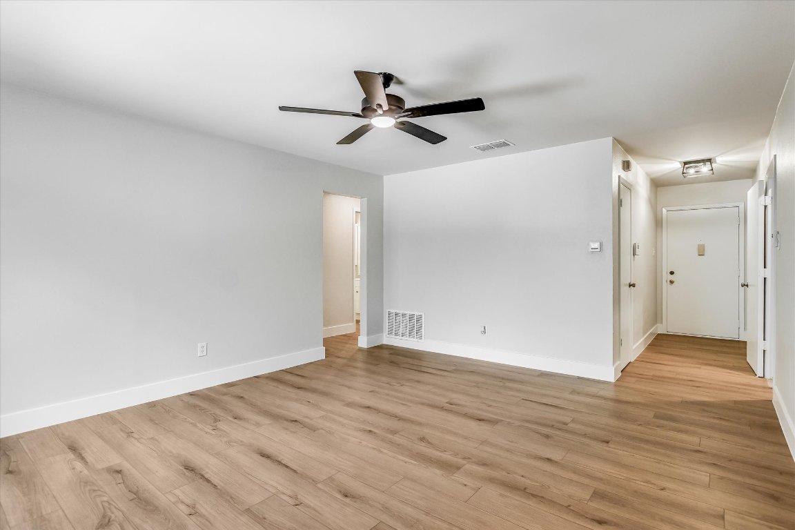 736 Wales Way Austin, TX 78748 - Photo 3 of 25 wooden floor in an empty room