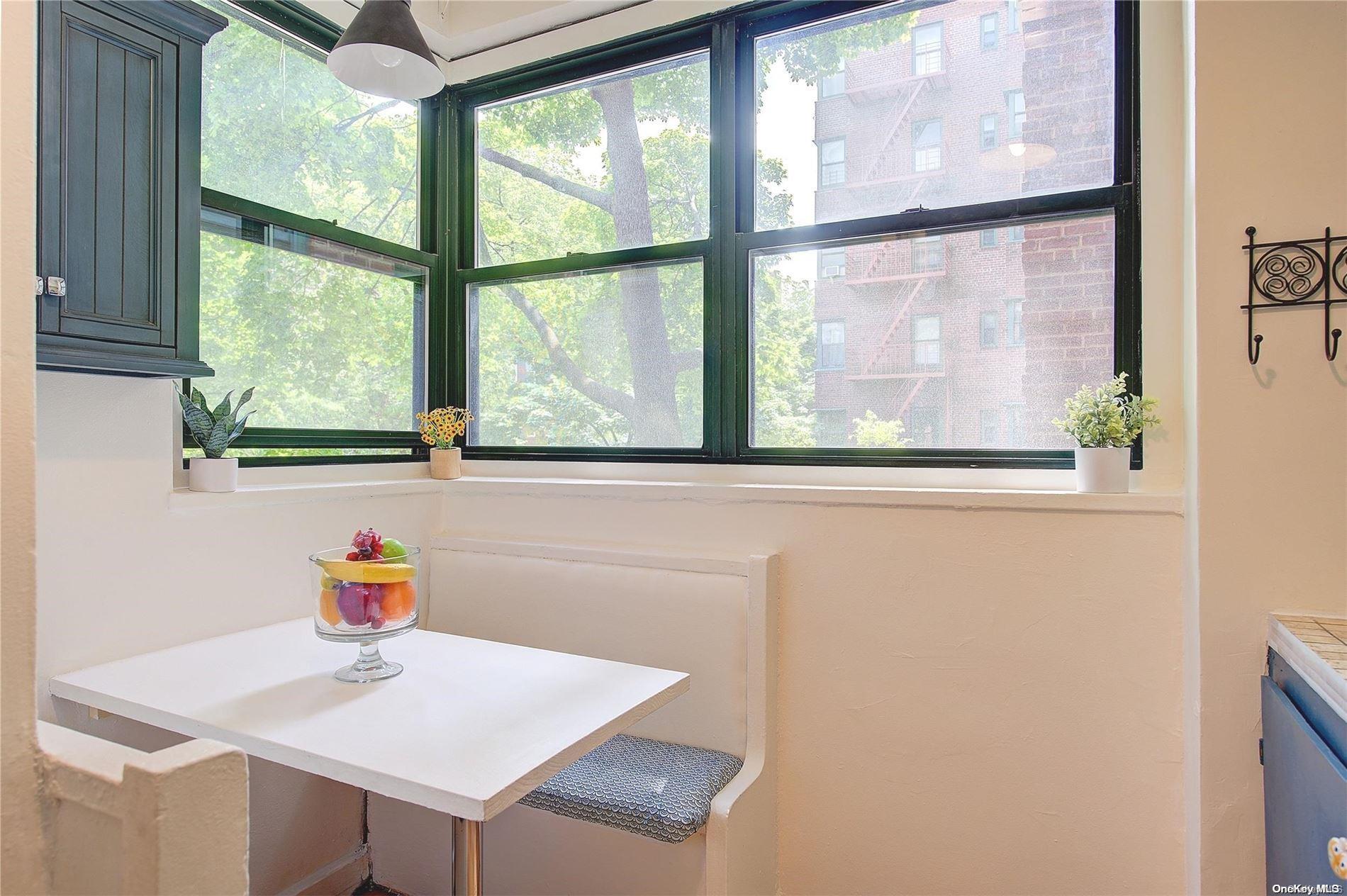 a workspace with furniture and a window
