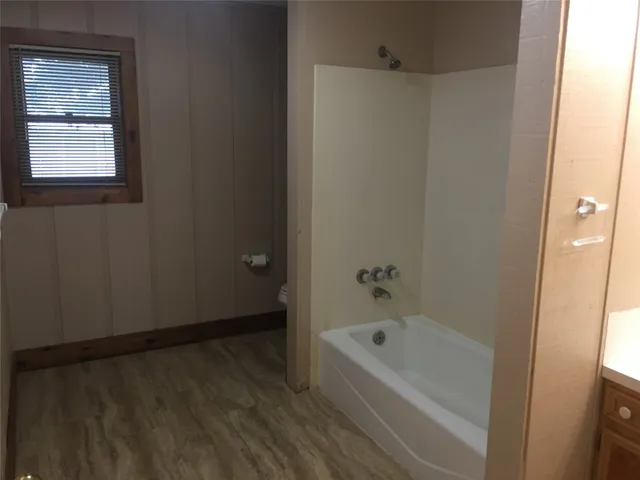 a bathroom with a bathtub