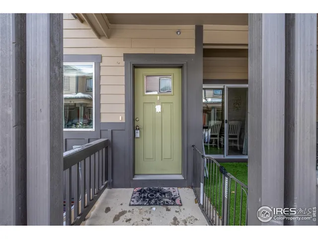 a view of a door and a window