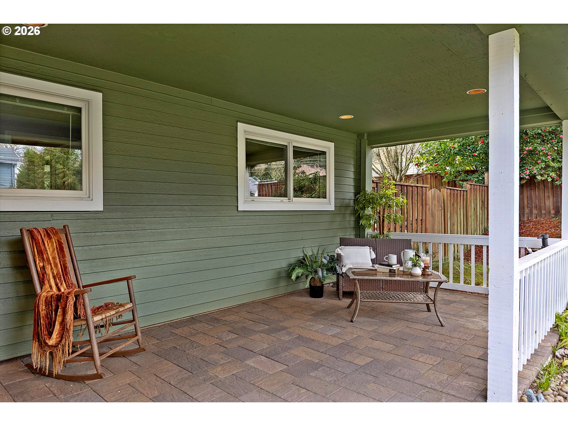 10540 Southwest Errol Street Tigard, OR 97223 - Photo 2 of 47 a outdoor living space with furniture and a window