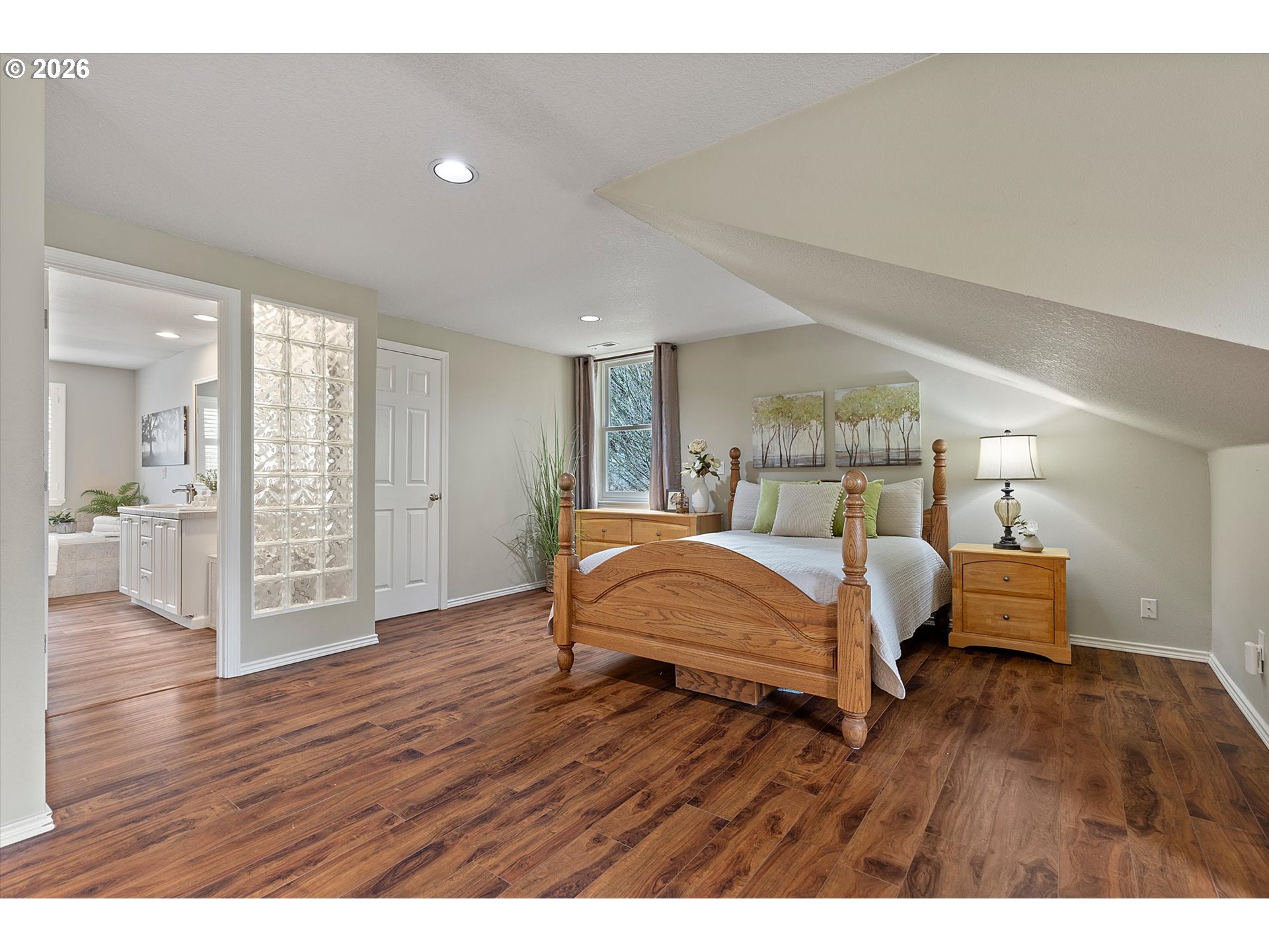 10540 Southwest Errol Street Tigard, OR 97223 - Photo 21 of 47 a bedroom with a bed and window