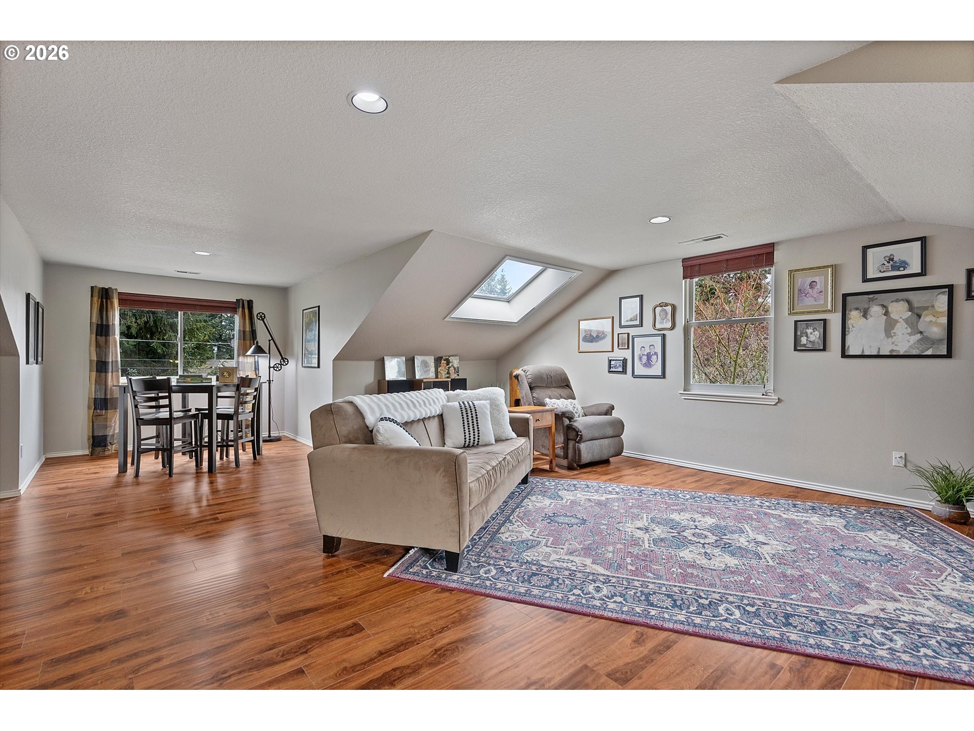 10540 Southwest Errol Street Tigard, OR 97223 - Photo 29 of 47 a living room with furniture and wooden floor