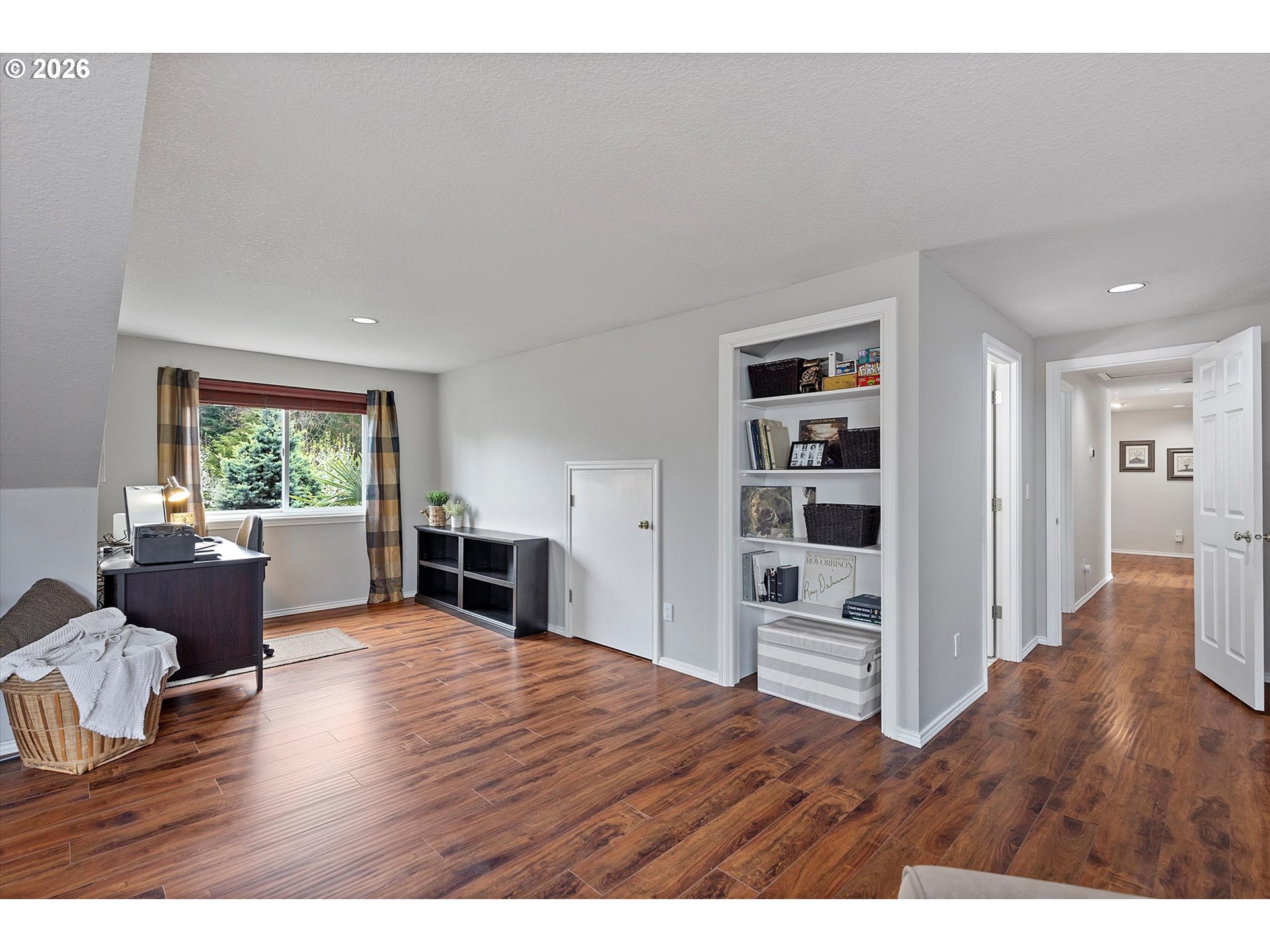 10540 Southwest Errol Street Tigard, OR 97223 - Photo 31 of 47 a living room with furniture and a wooden floor