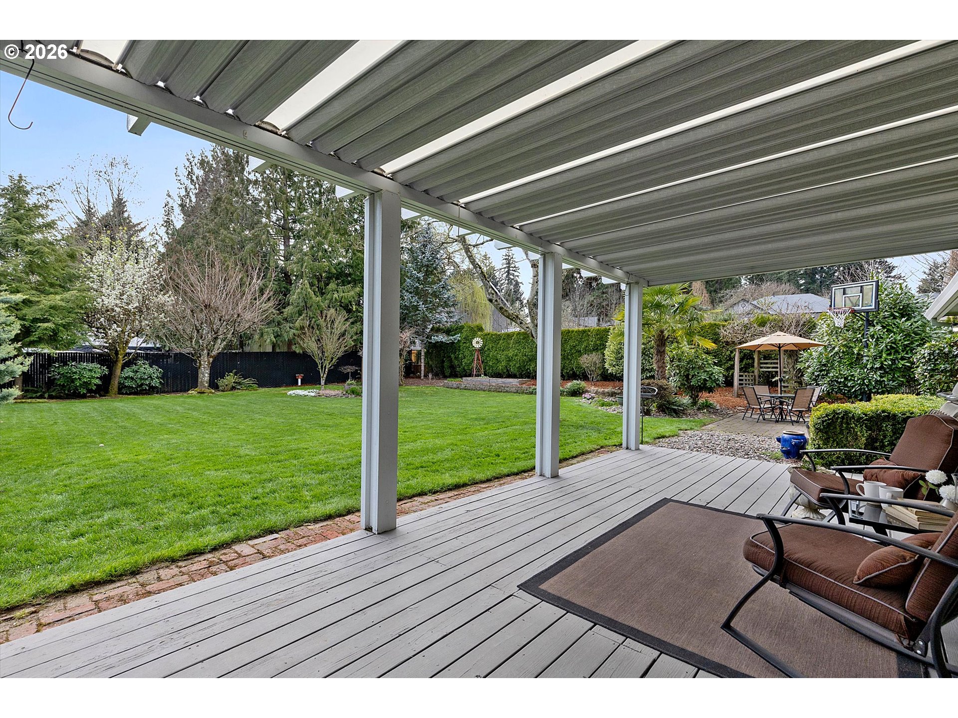 10540 Southwest Errol Street Tigard, OR 97223 - Photo 33 of 47 a view of a backyard with sitting area