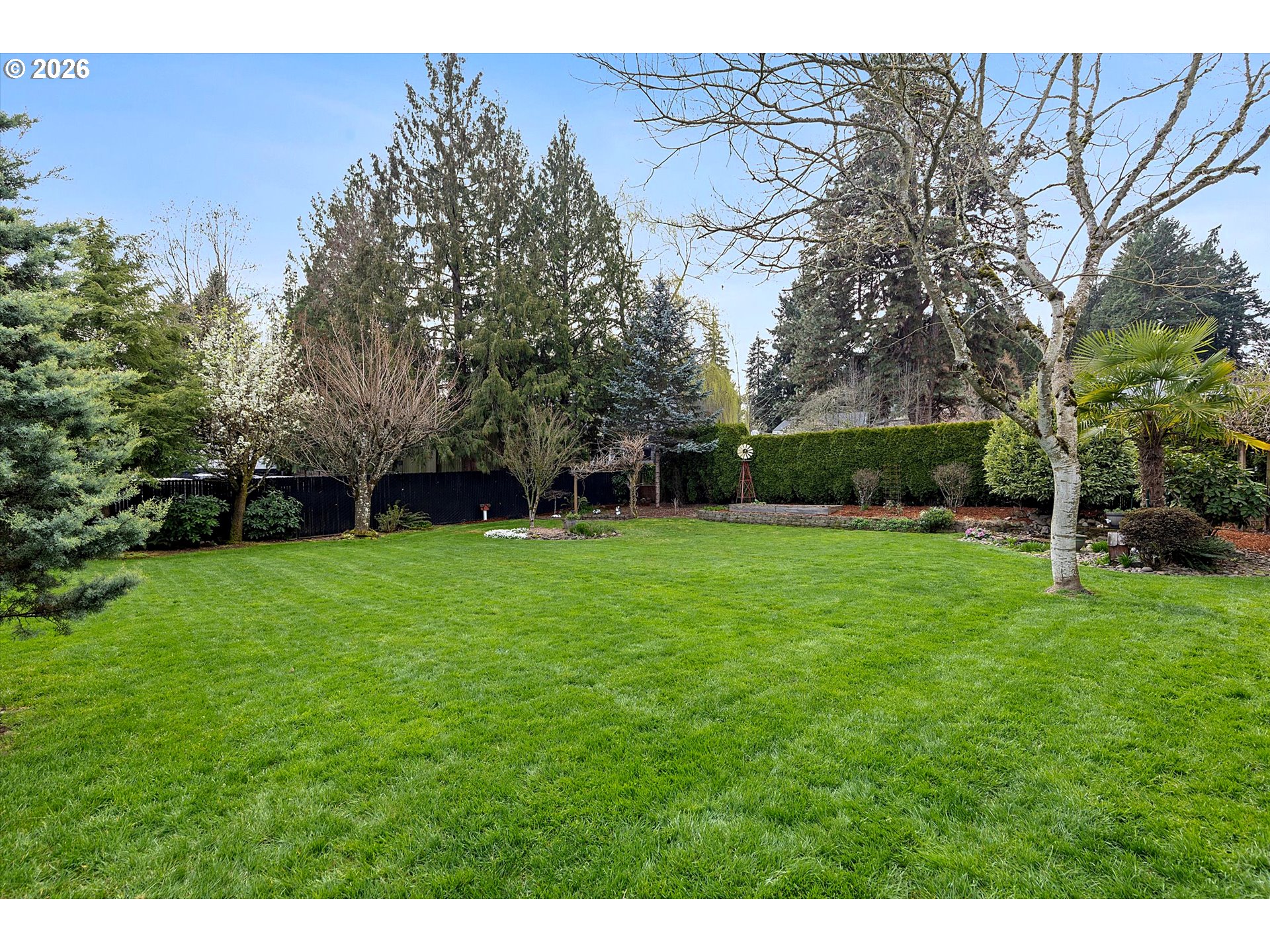 10540 Southwest Errol Street Tigard, OR 97223 - Photo 38 of 47 a view of a yard with a tree
