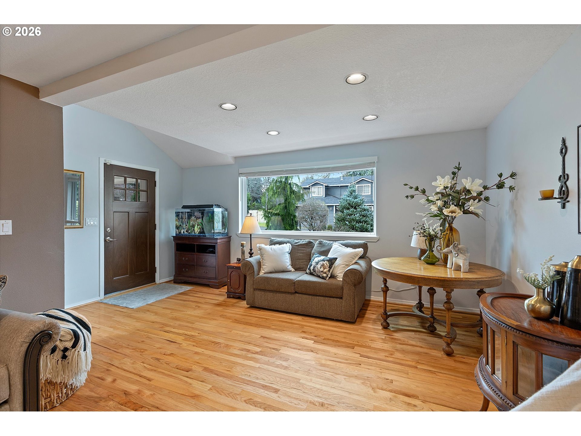 10540 Southwest Errol Street Tigard, OR 97223 - Photo 4 of 47 a living room with furniture and a large window