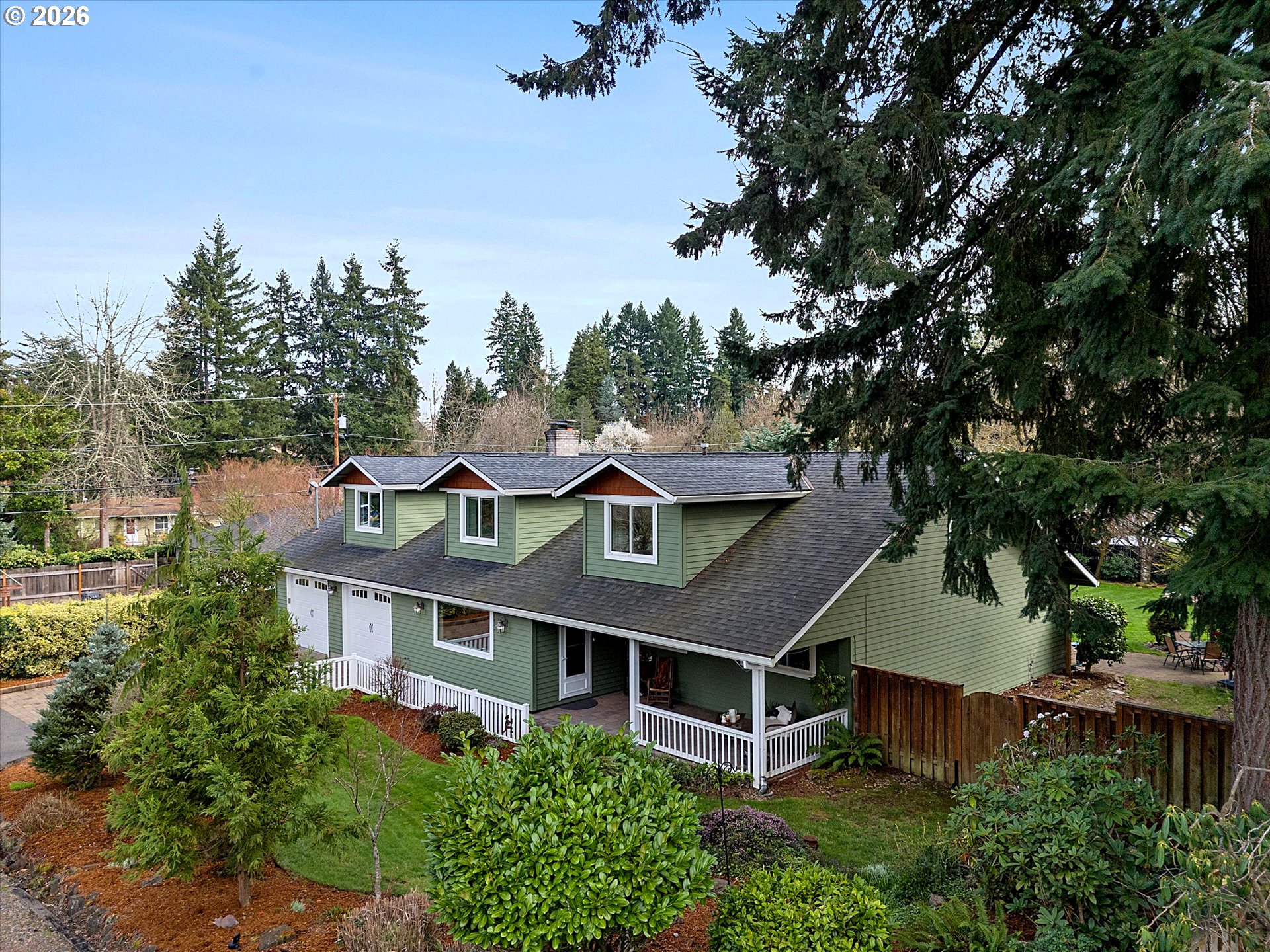 10540 Southwest Errol Street Tigard, OR 97223 - Photo 42 of 47 an aerial view of a house with a yard and tree s