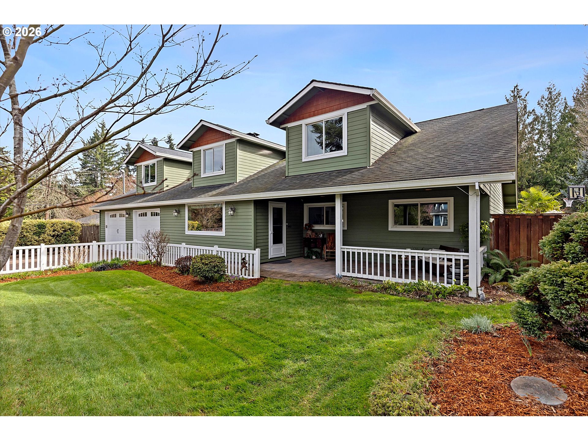 10540 Southwest Errol Street Tigard, OR 97223 - Photo 43 of 47 a front view of a house with garden