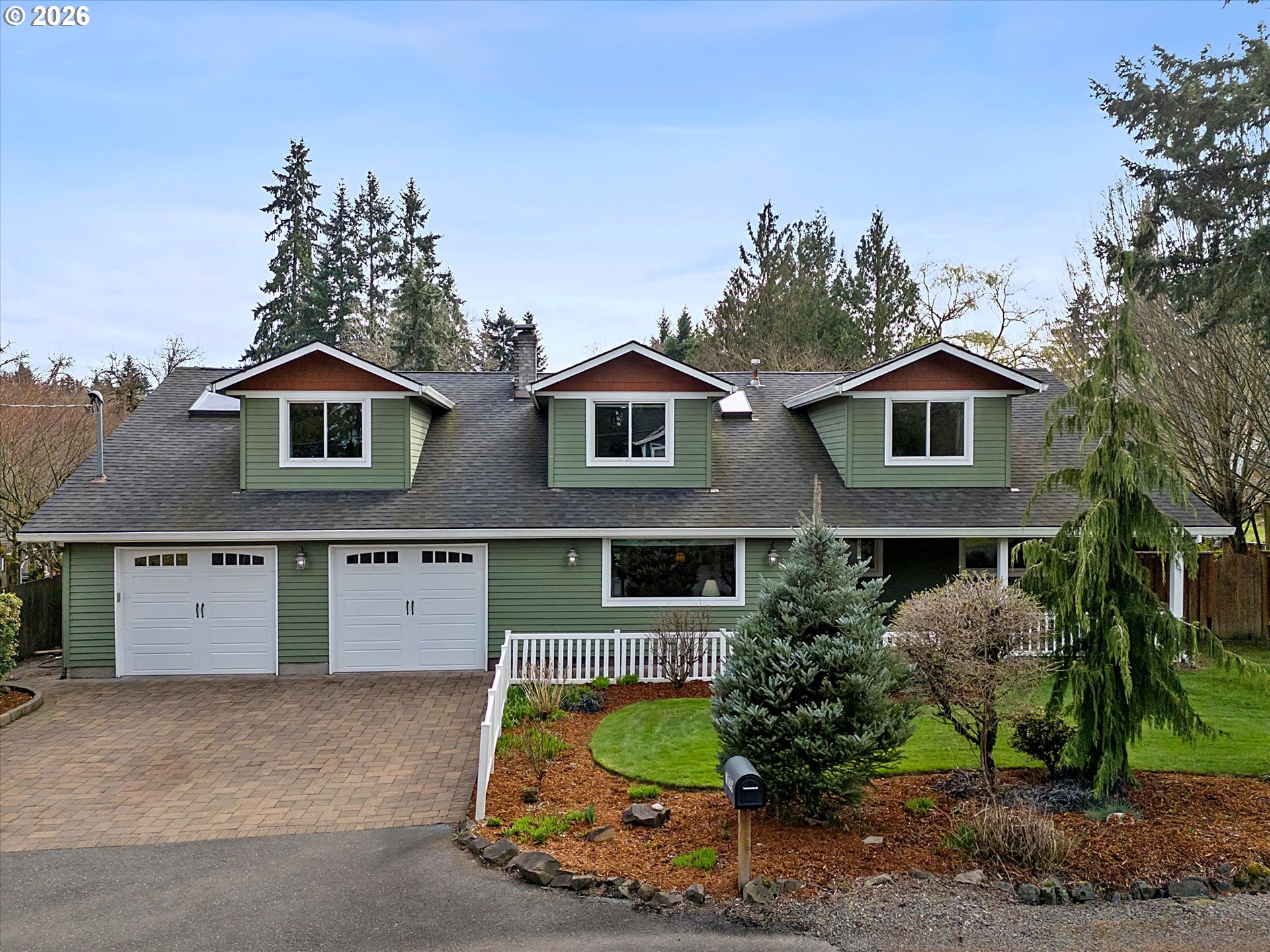 10540 Southwest Errol Street Tigard, OR 97223 - Photo 44 of 47 a front view of a house with garden
