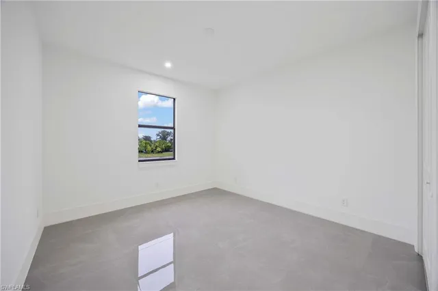 a bathroom with a double vanity sink mirror and shower