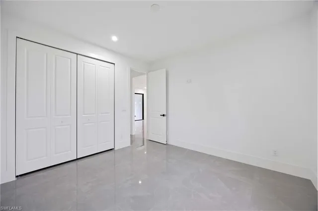 a bathroom with double sink and mirror