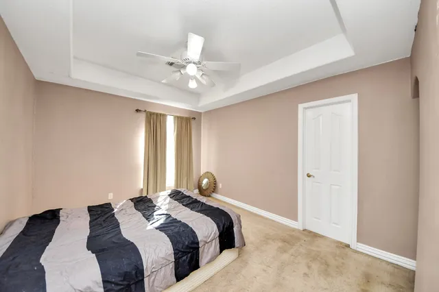 a bathroom with a sink a mirror and a shower