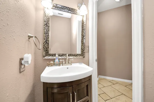 a view of a bedroom with a washer and dryer