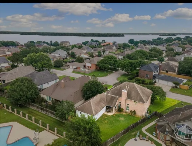 a view of a living room and kitchen with furniture