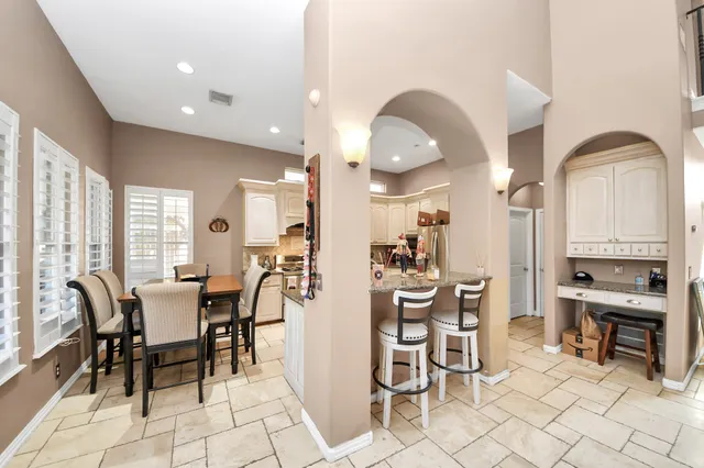 a view of a dining room with furniture