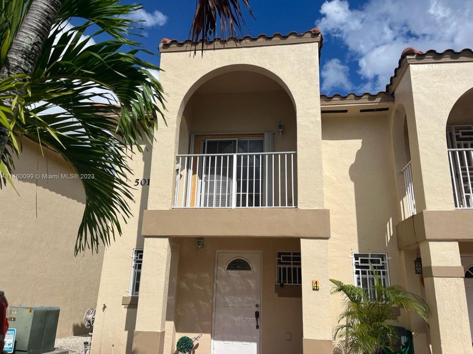 501 West 68th Street, Unit 4 Hialeah, FL 33014 - Photo 3 of 20 a view of entryway with a front door