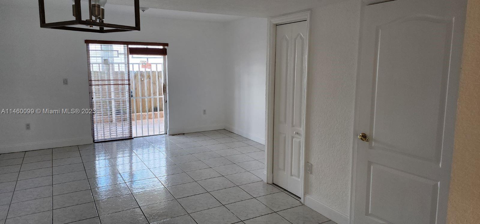 501 West 68th Street, Unit 4 Hialeah, FL 33014 - Photo 7 of 20 a view of a hallway with entryway