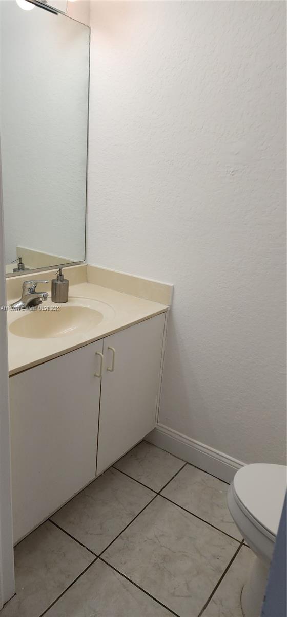 501 West 68th Street, Unit 4 Hialeah, FL 33014 - Photo 10 of 20 a bathroom with a sink and vanity