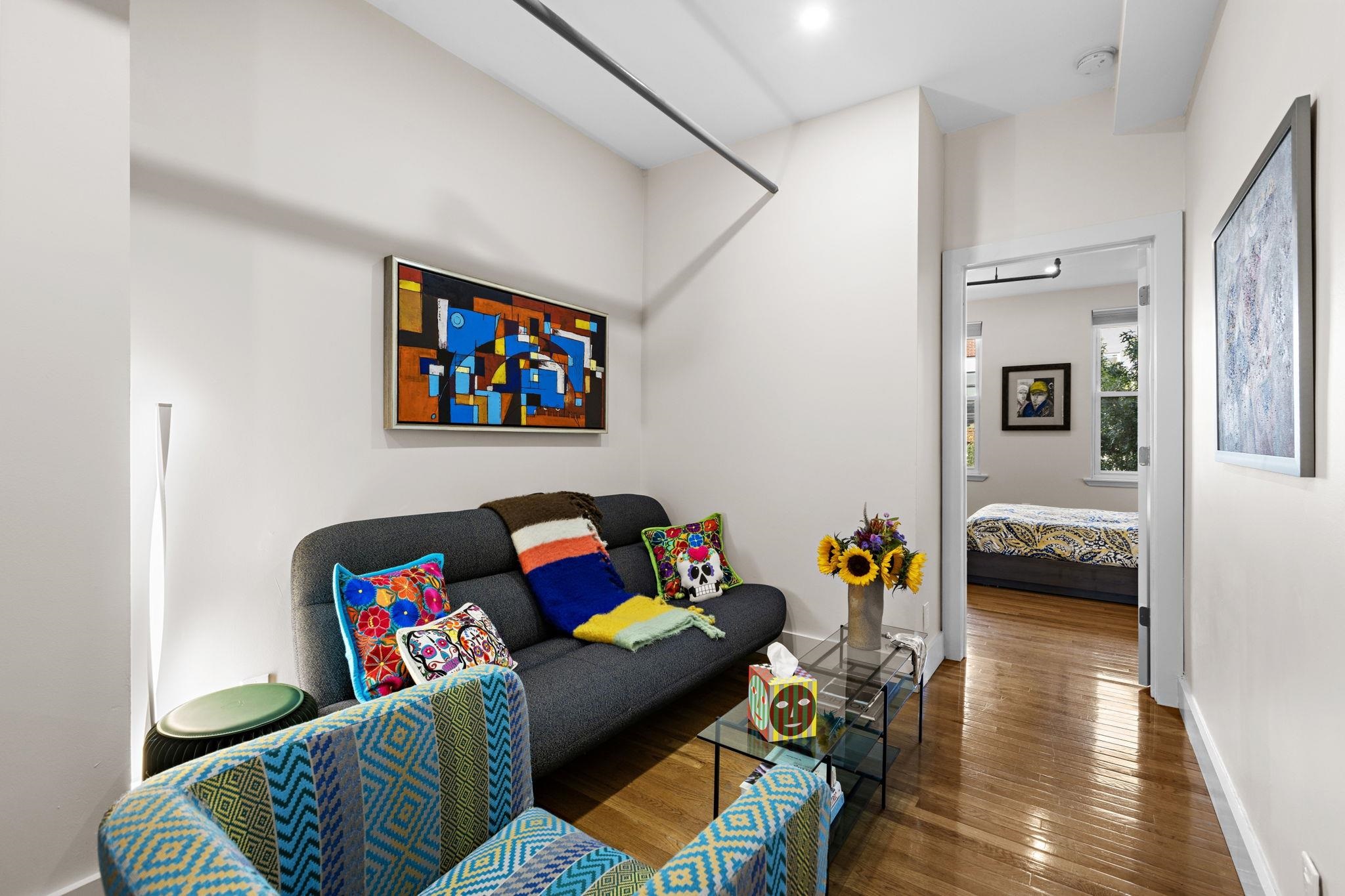 309 Monroe Street, Unit FIVE Hoboken, NJ 07030 - Photo 2 of 14 a living room with furniture and a view of bedroom