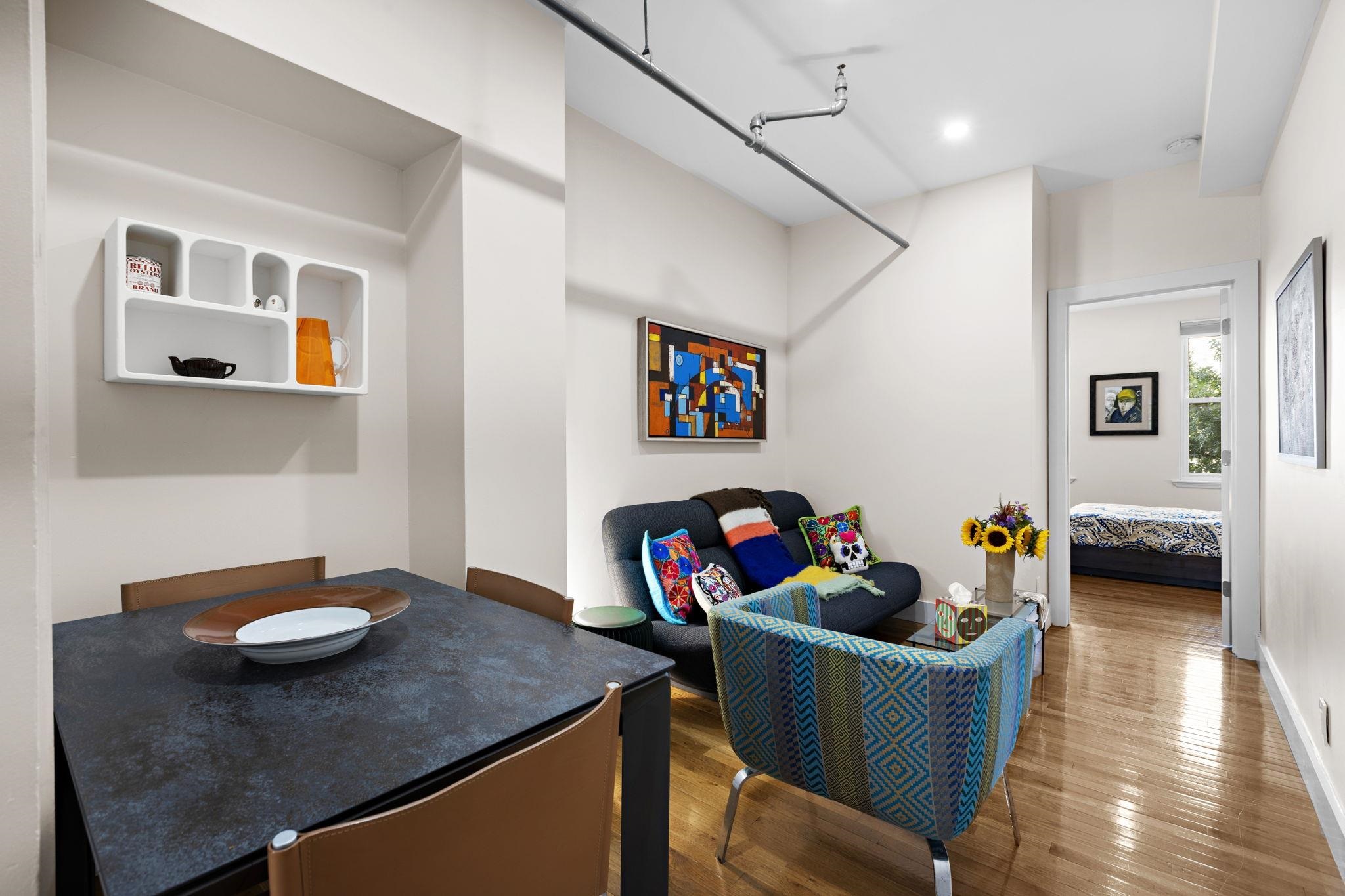 309 Monroe Street, Unit FIVE Hoboken, NJ 07030 - Photo 3 of 14 a living room with dining room and wooden floor