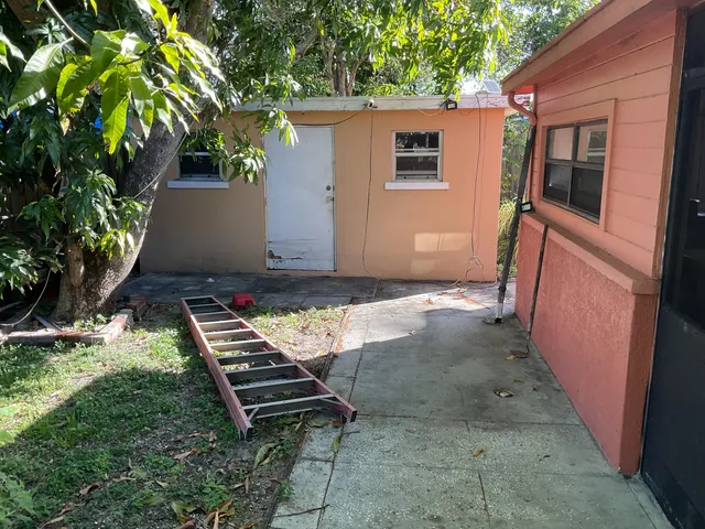 a backyard of a house with lots of green space