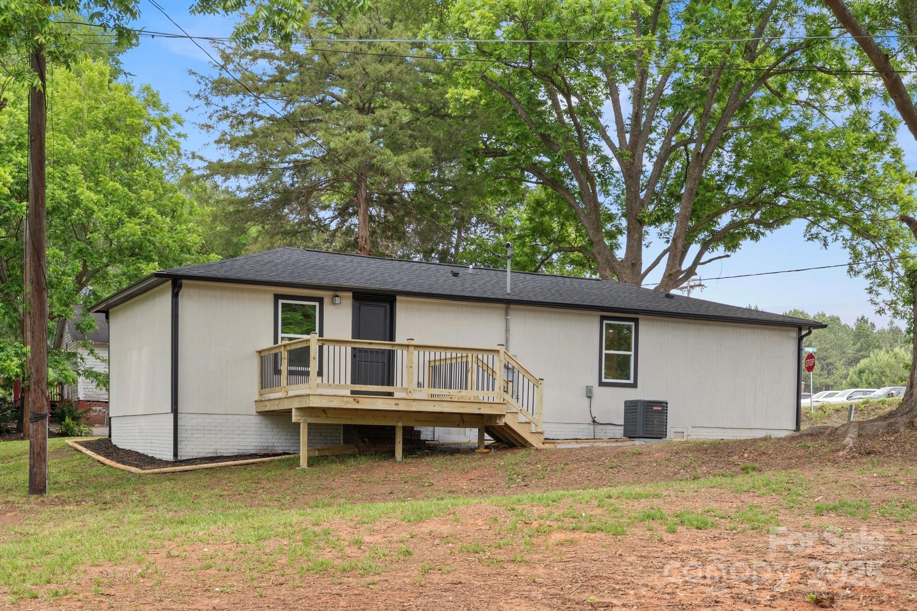 1574 Mangum Drive Lancaster, SC 29720 - Photo 22 of 22 a house with trees in the background