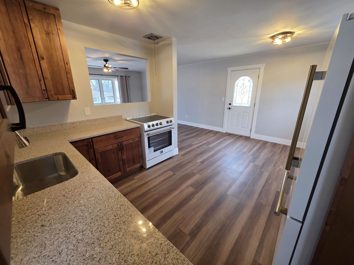 1206 10th Avenue North Clinton, IA 52732 - Photo 12 of 27 a view of a kitchen from the hallway