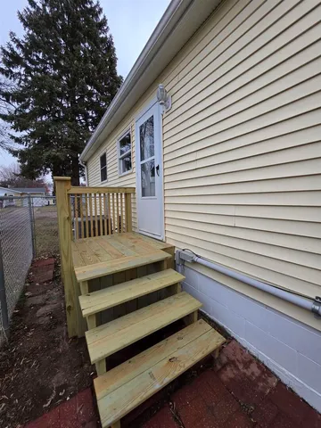 a view of a back yard of the house