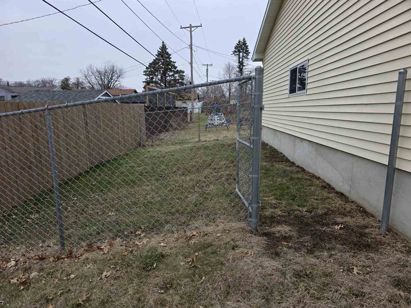 1206 10th Avenue North Clinton, IA 52732 - Photo 26 of 27 a view of a back yard of the house