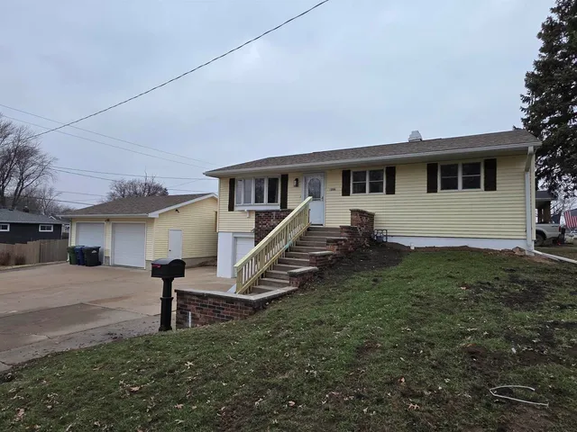 a house view with a backyard space