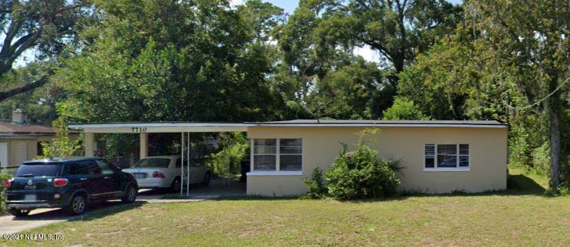 a house view with a garden space