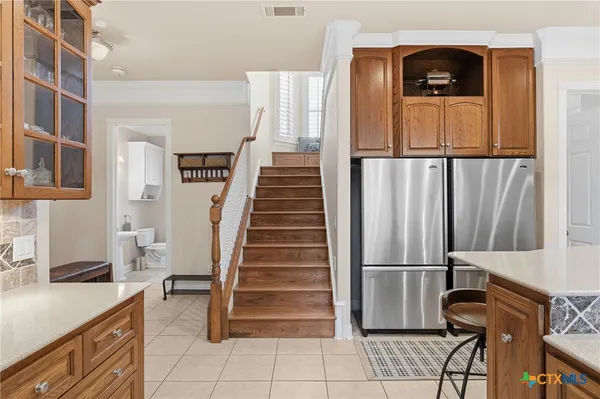 a bedroom with furniture and a fireplace