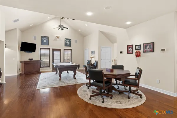 a bedroom with a workspace