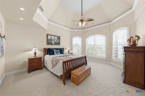 a bathroom with a double vanity sink mirror and shower