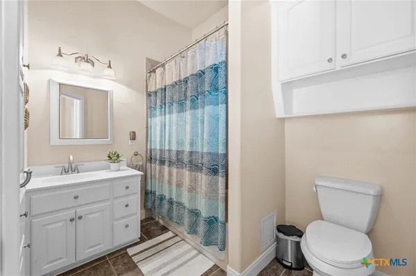 a view of a swimming pool with a yard