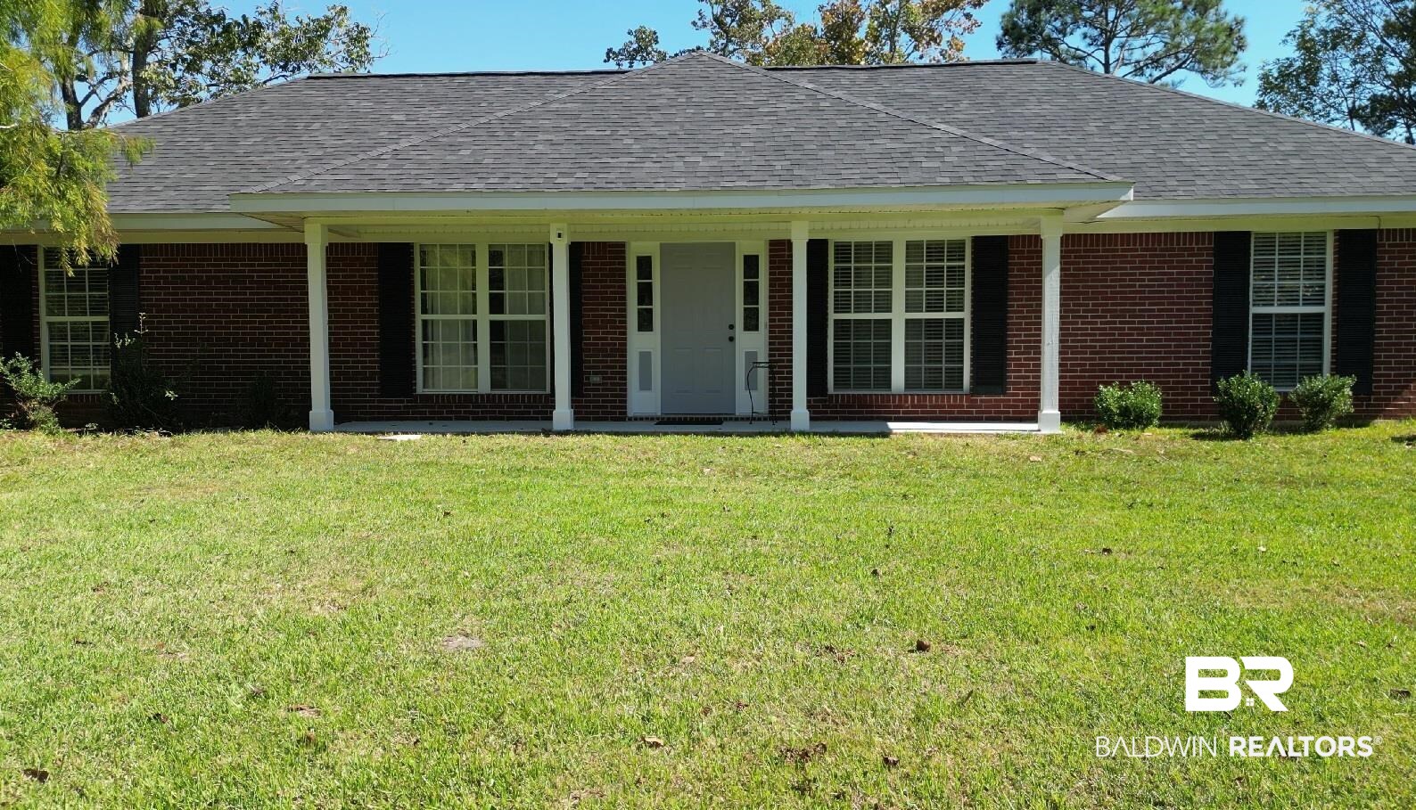 14313 Hemley Road Coden, AL 36523 - Photo 18 of 44 View of front of house with a front yard