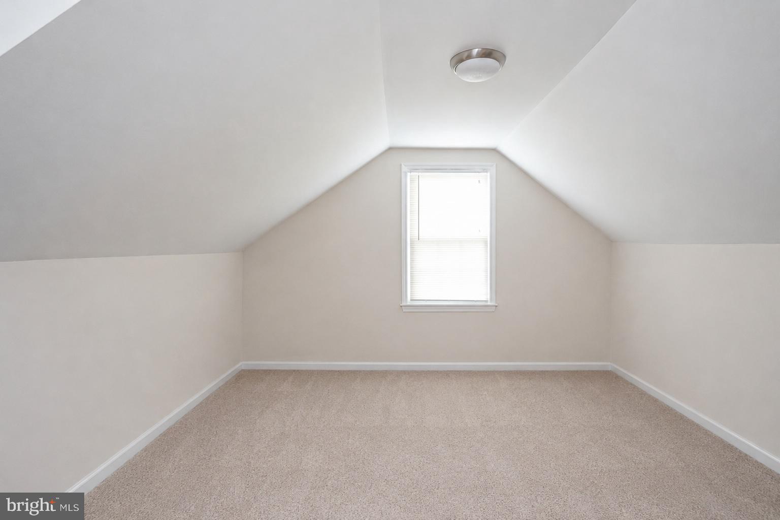 35 St Charles Place Runnemede, NJ 08078 - Photo 18 of 32 an empty room with a window