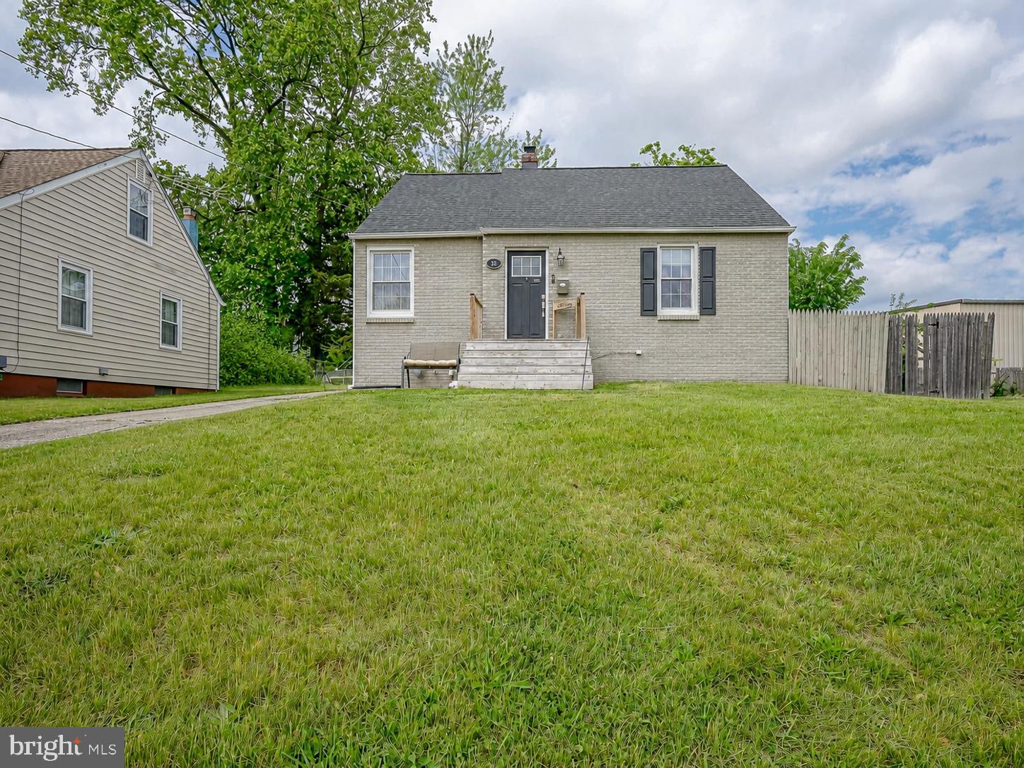 35 St Charles Place Runnemede, NJ 08078 - Photo 2 of 32 a front view of a house with a yard and garage