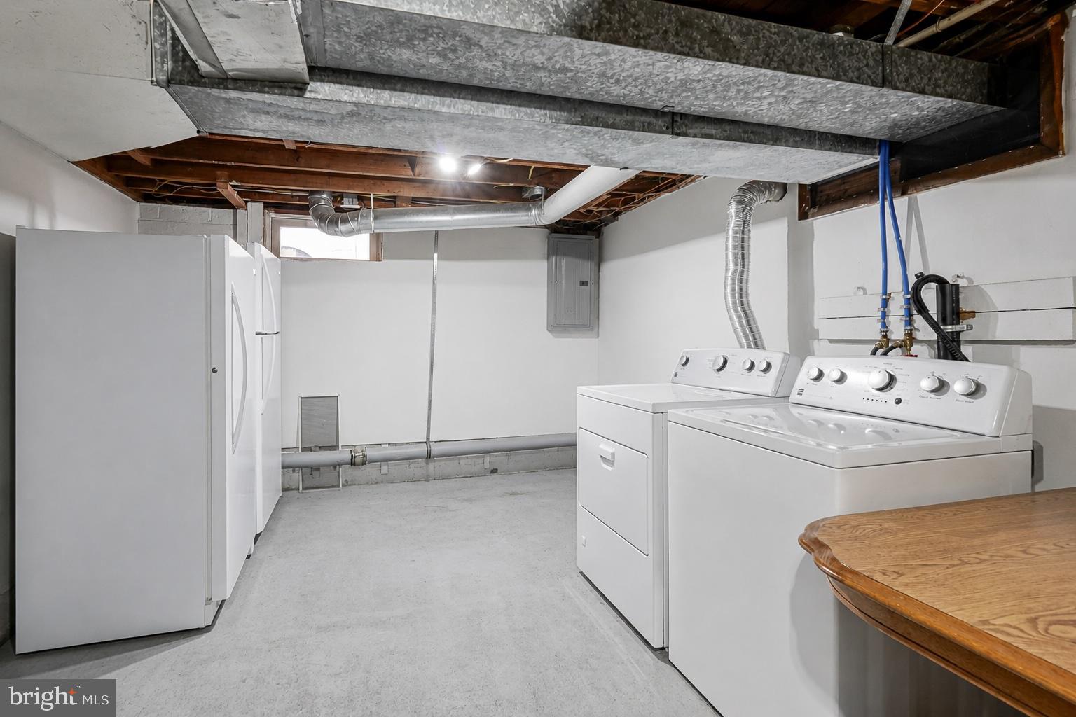 35 St Charles Place Runnemede, NJ 08078 - Photo 24 of 32 a utility room with dryer and washer
