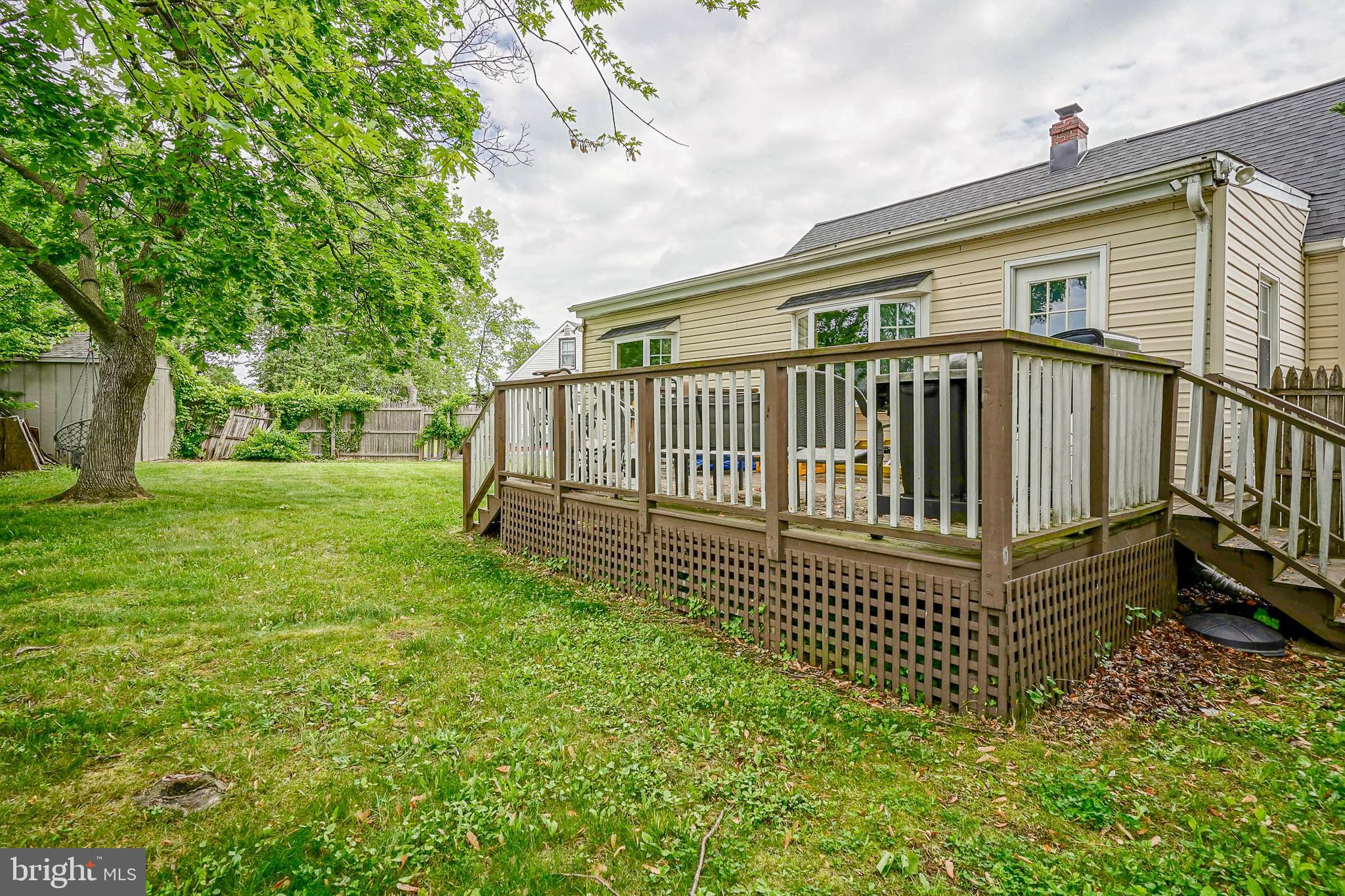 35 St Charles Place Runnemede, NJ 08078 - Photo 27 of 32 a view of a house with a yard and deck
