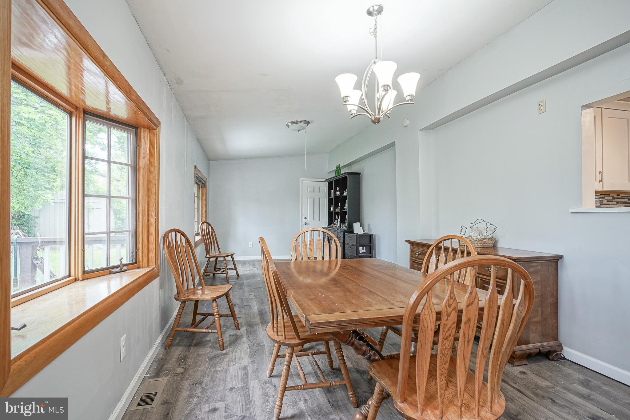 35 St Charles Place Runnemede, NJ 08078 - Photo 10 of 32 a view of a dining room with furniture window and wooden floor