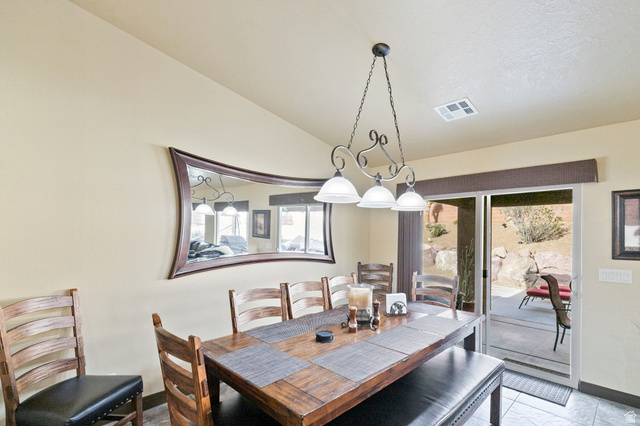 210 Talon Court Ivins, UT 84738 - Photo 17 of 60 Dining space with vaulted ceiling